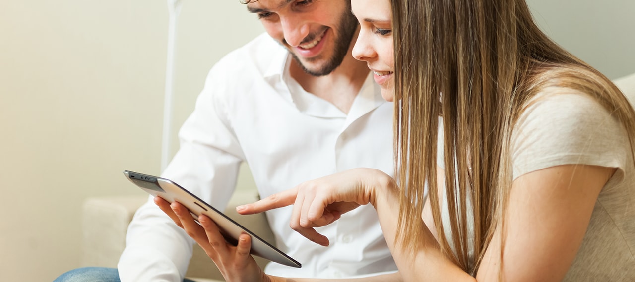 Hotel Guests Using Tablet